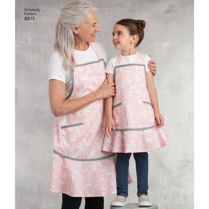 8815 Children's and Misses' Aprons. Size: Kid´s S-L (3-8 y) / Adults S-L (36-46)