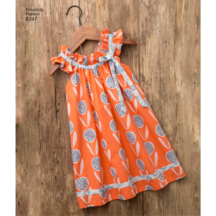 8347 Toddlers' Dress, Top, Knit Capris, and Stuffed Bunny. Size: 6 m-4 y